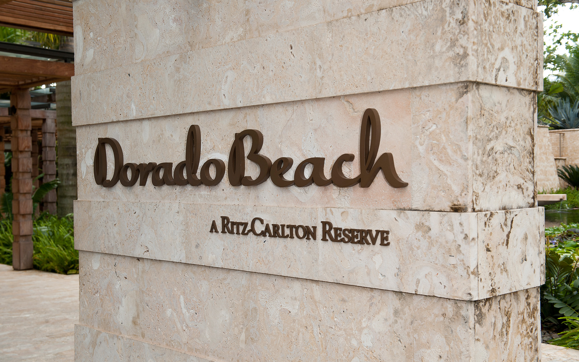 Dimensional Letters that read Dorado Beach, Flat Cut Metal Letters Mounted on Column