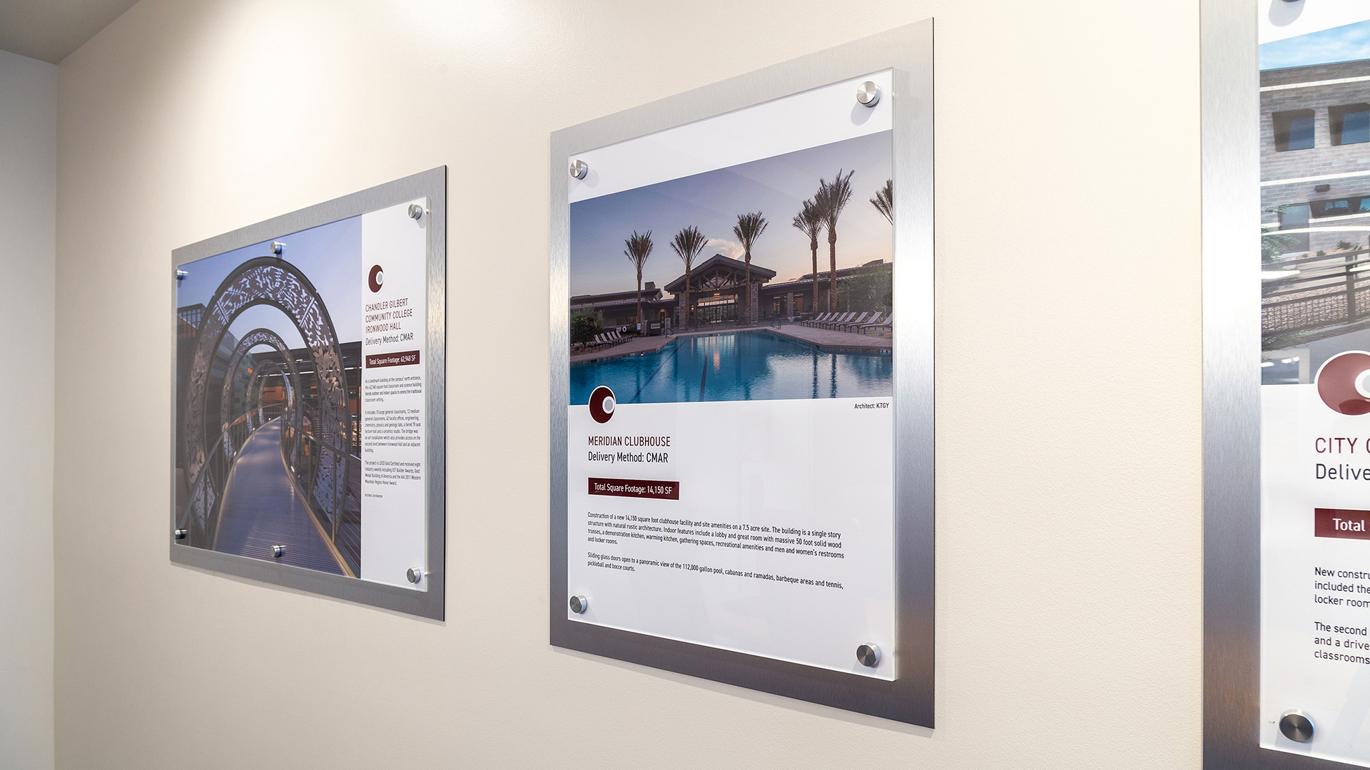 Large scale restroom symbols and vinyl wall graphics wrapping around wall in fitness area