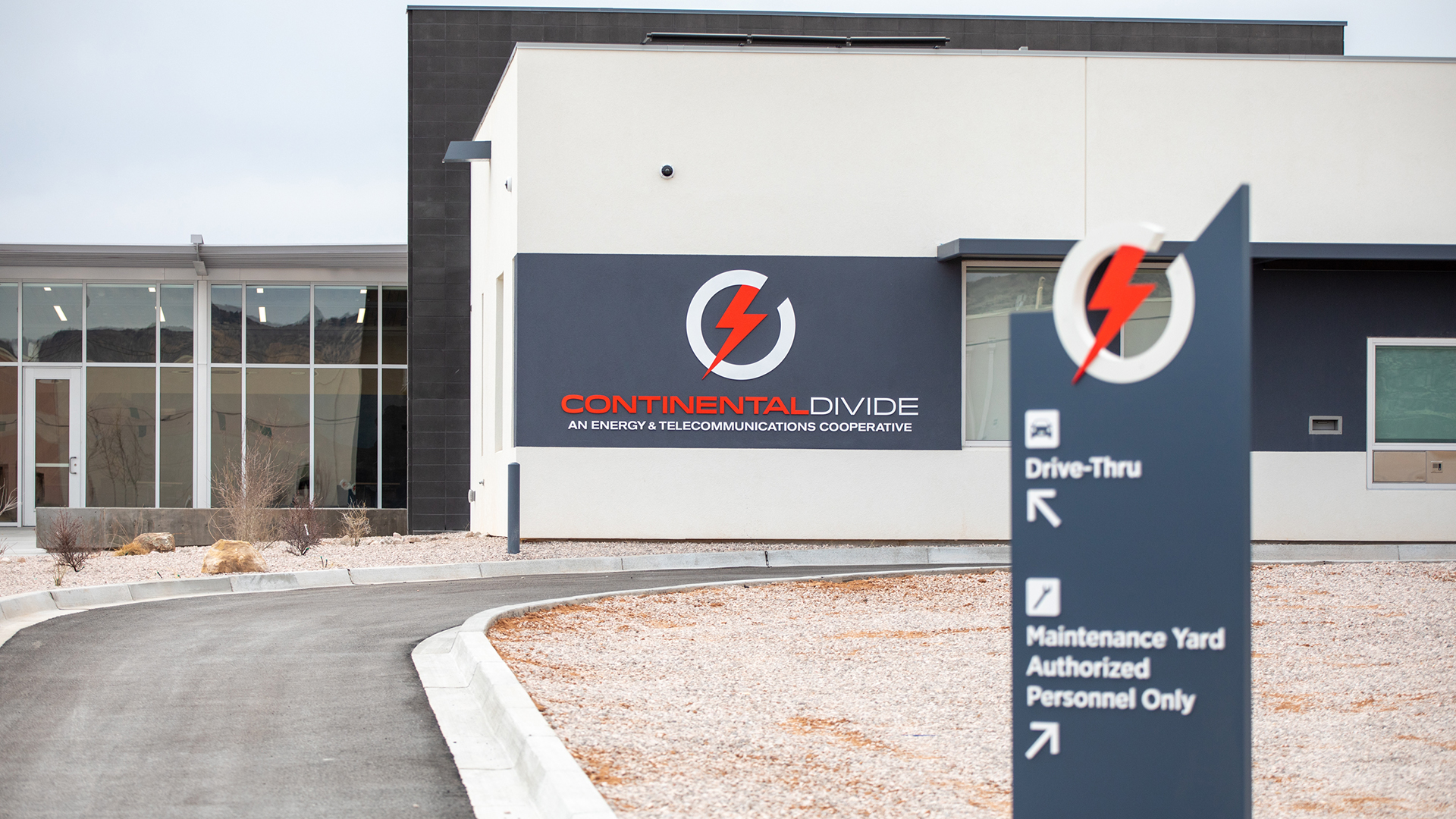 Exterior building signage featuring dimensional logo and corporate branding