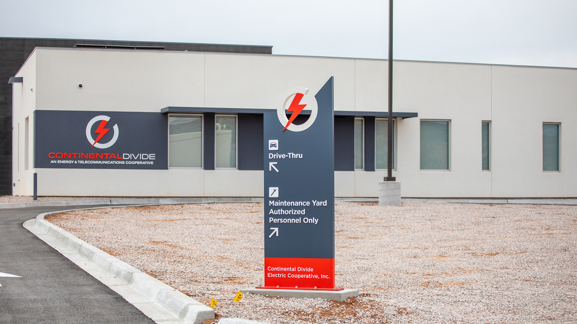 exterior wayfinding sign directing vehicles to drive-thru