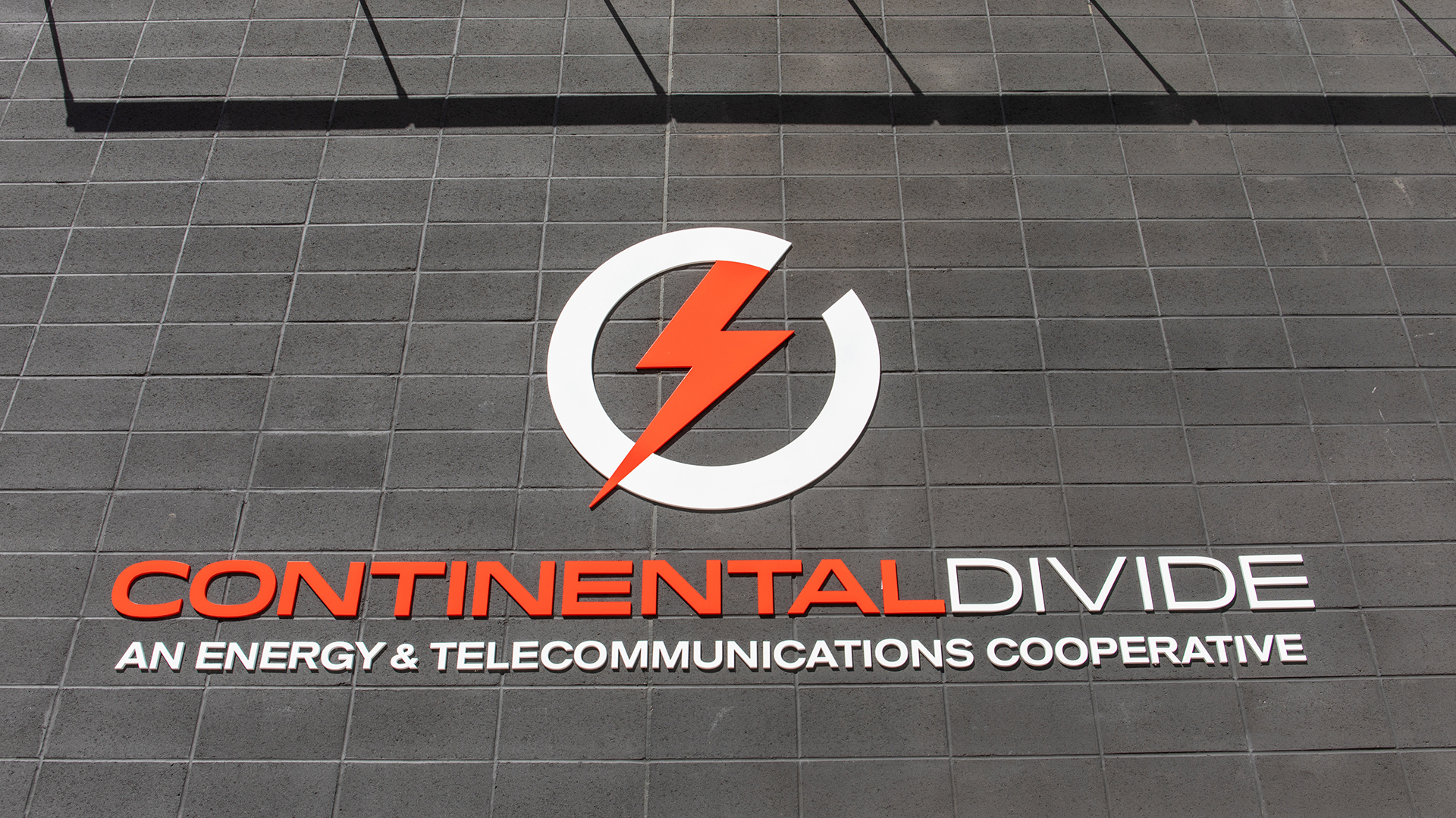 flat cut acrylic letters mounted on building facade