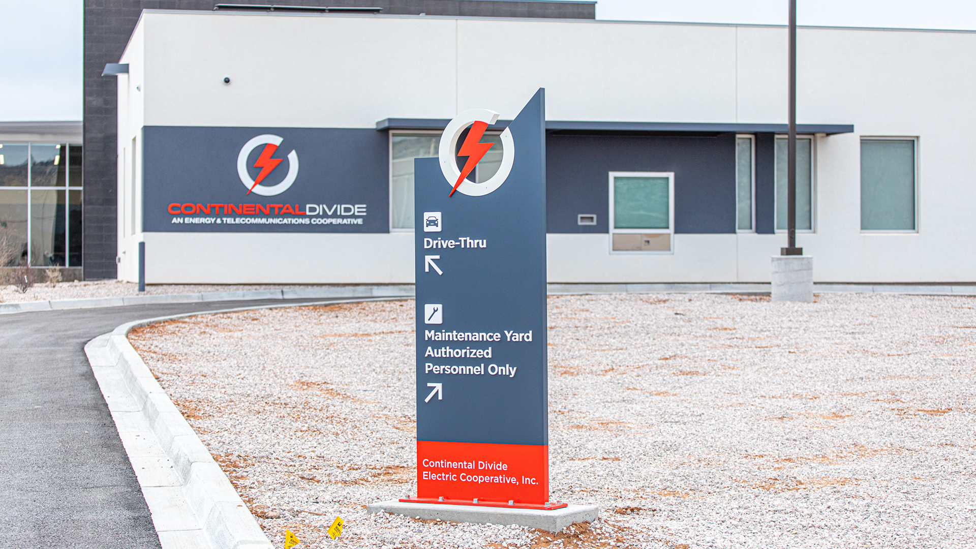 exterior wayfinding sign integrated with corporate branding