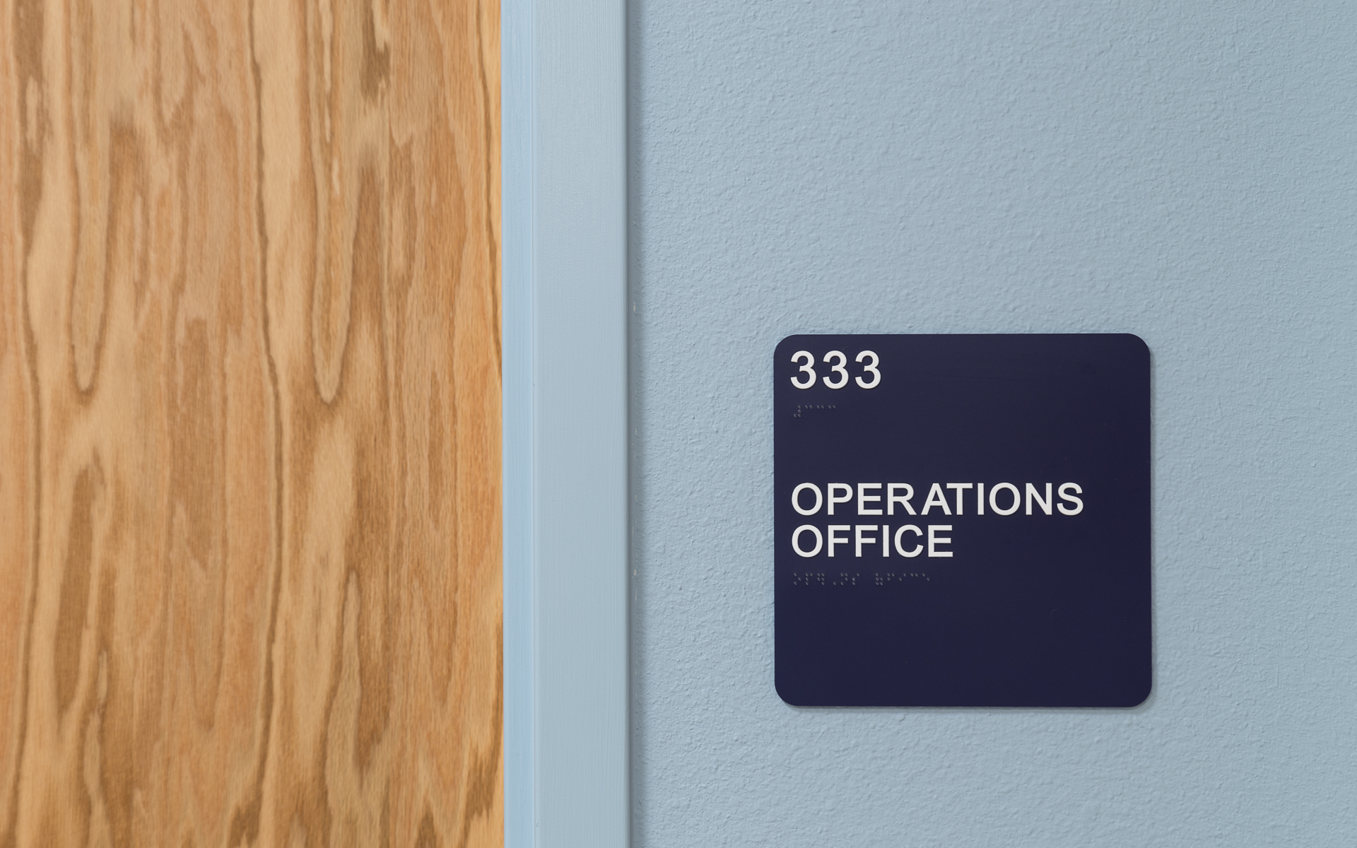 ADA room sign for custodian space in school facility