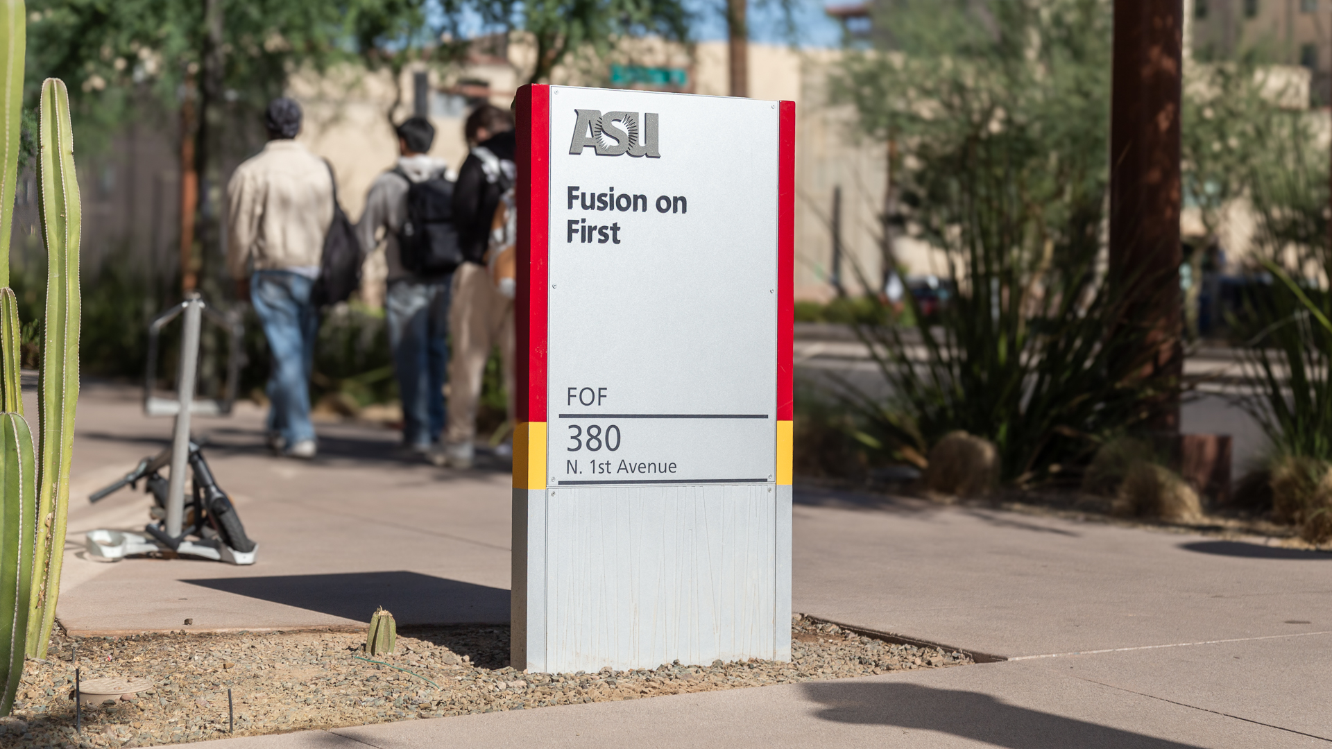 ASU Fusion on First monument sign located along pedestrian walkway in downtown Phoenix student housing development