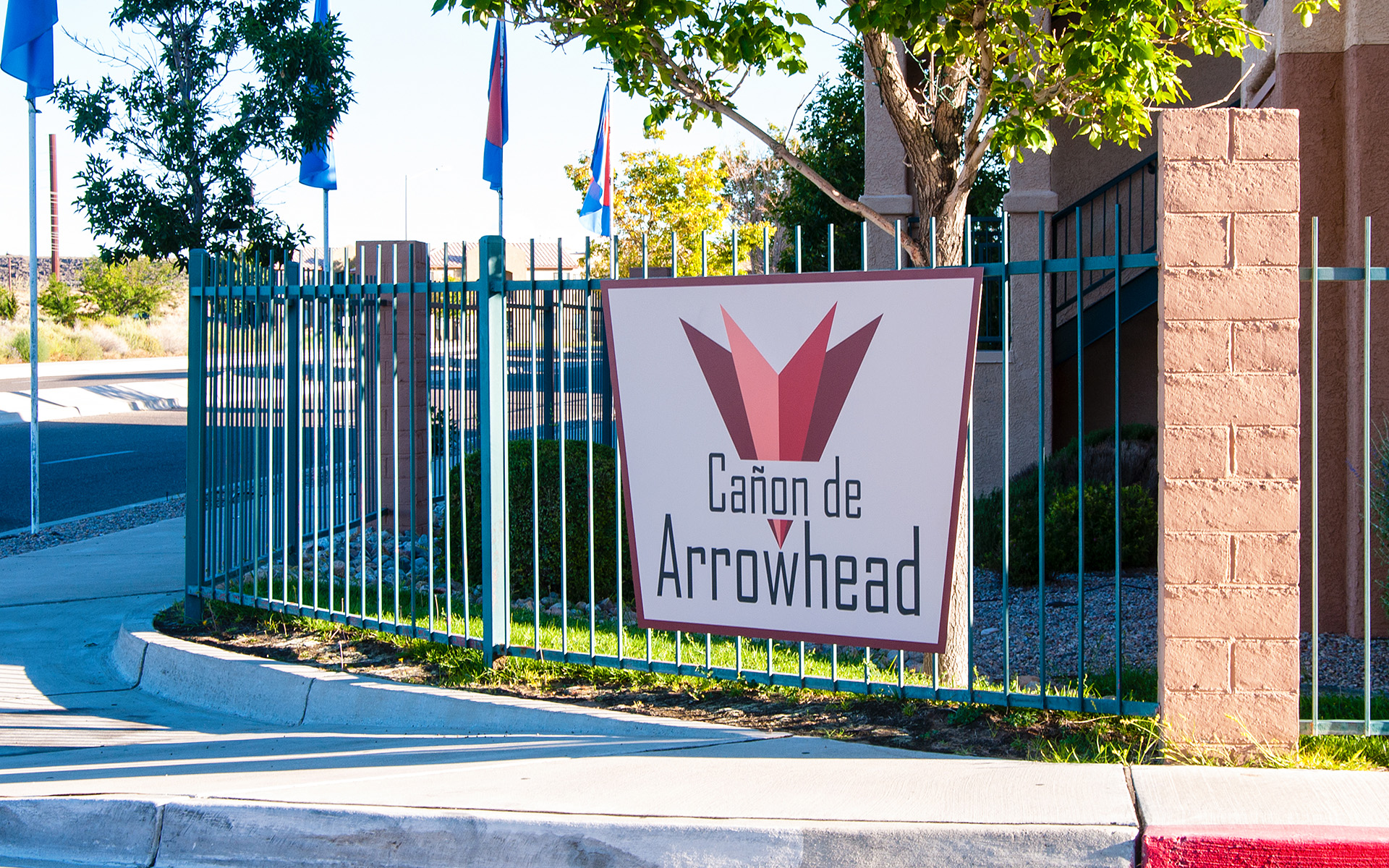 Apartment community entry monument sign with modern branding and roadside visibility