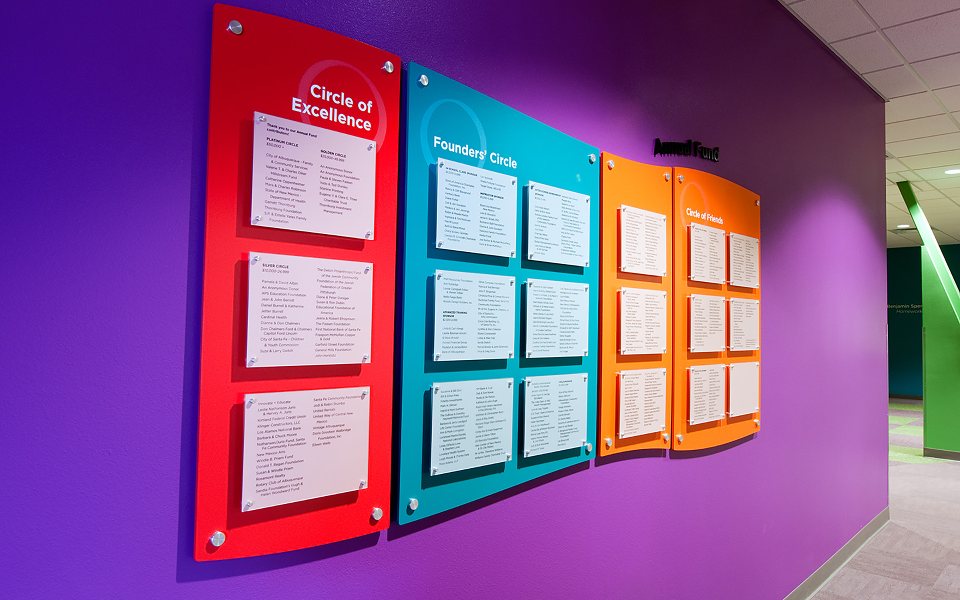 Bright acrylic donor wall panels with mounted inserts