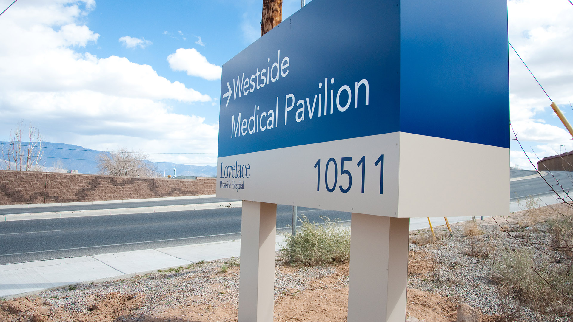 Detail of exterior monument sign at Lovelace Westside Hospital showing branding and wayfinding elements