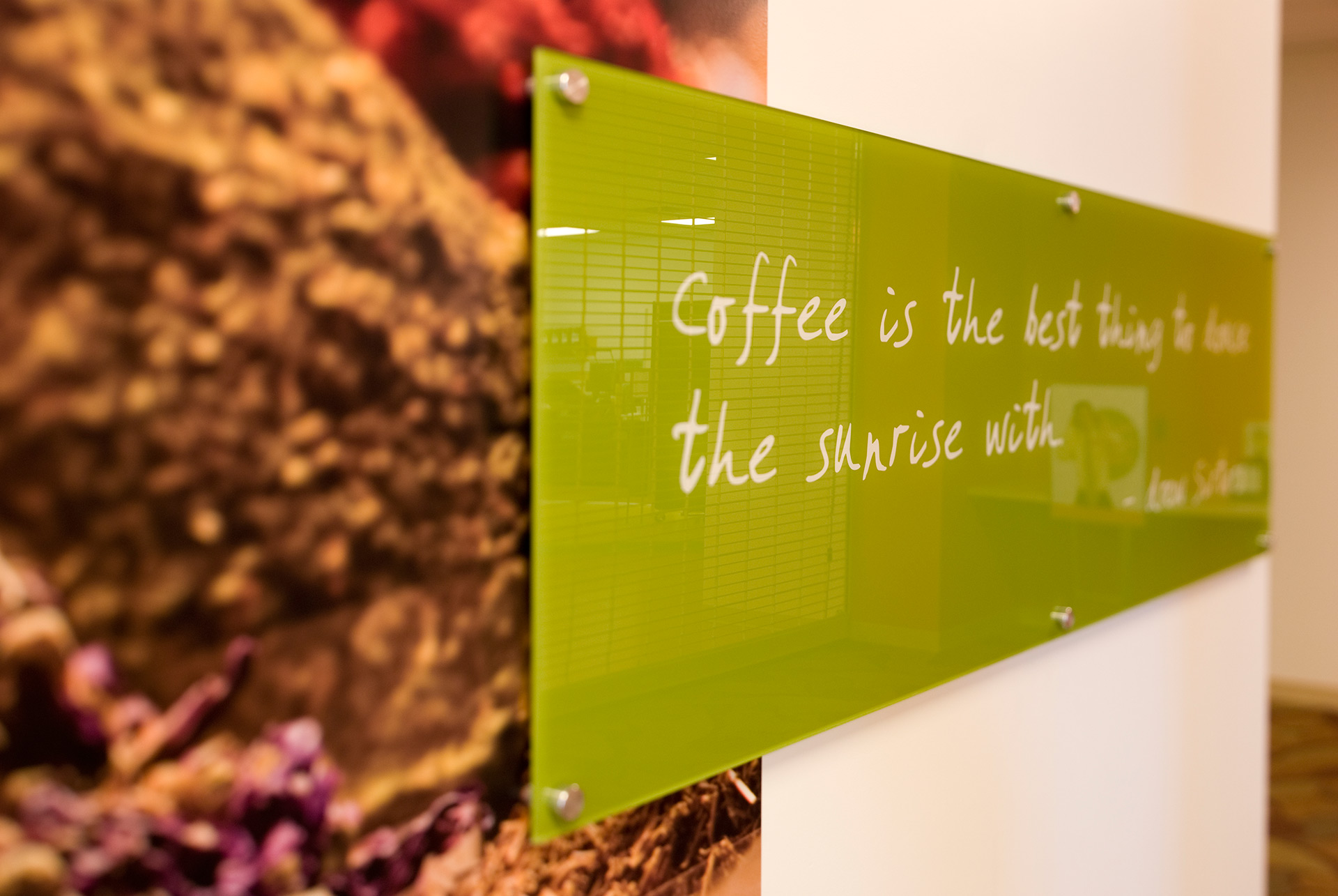 Acrylic wall mounted graphics display system Acrylic branding display system with second surface graphics and standoffs