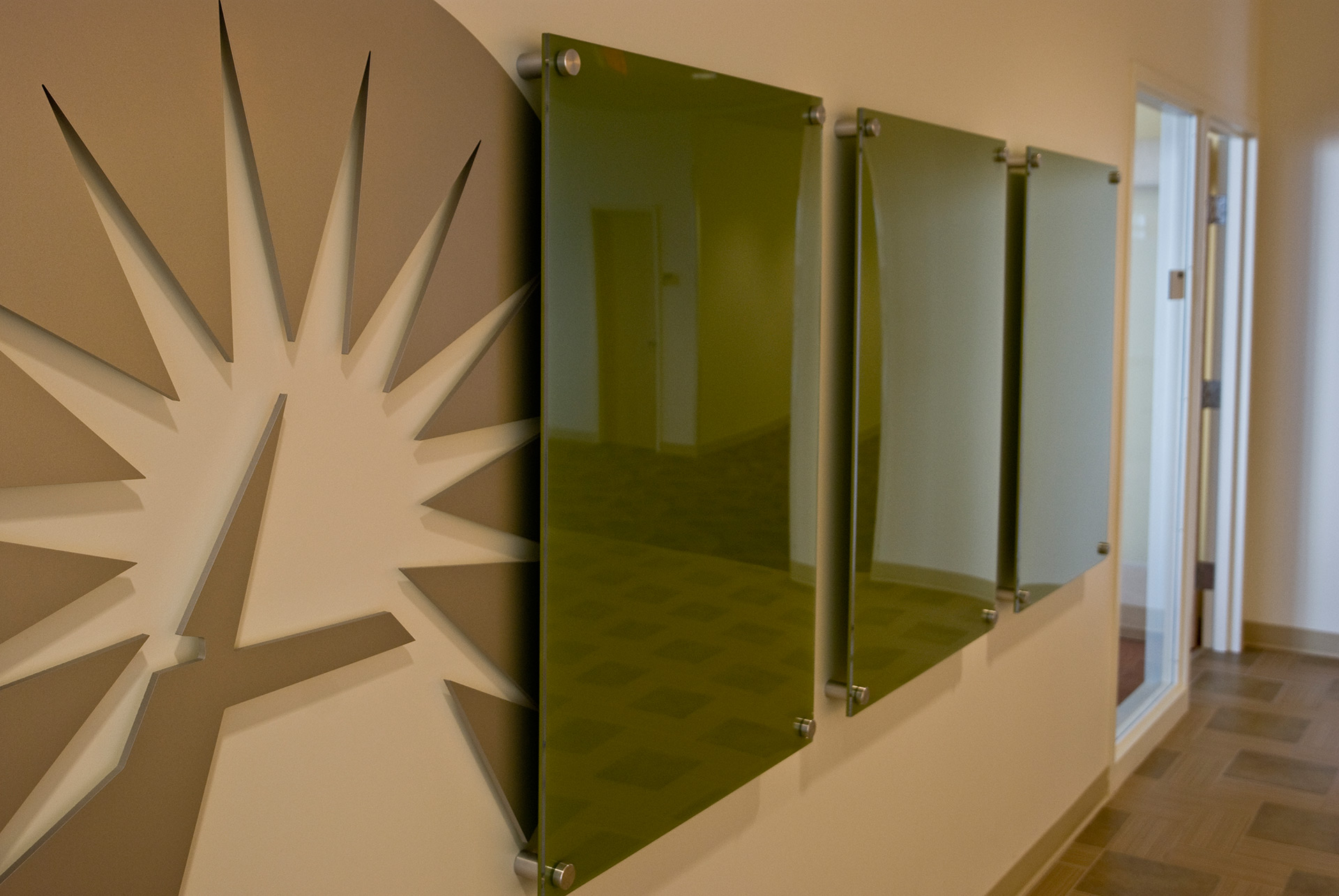 Interior entry branding wall with graphics and signage