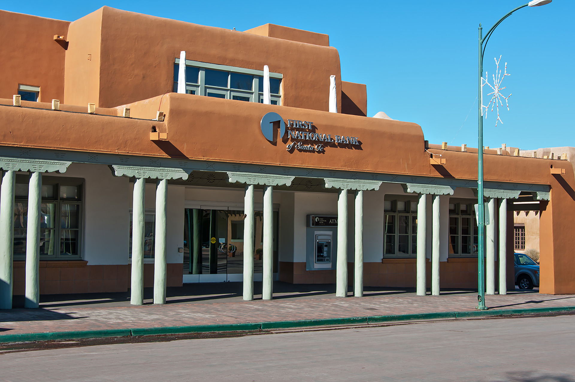 Fabricated channel letters building identification sign on exterior facade at First National Bank Santa Fe