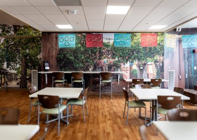 Custom wallcovering in a Presbyterian Hospital cafeteria featuring an Old Town Albuquerque photographic wall mural
