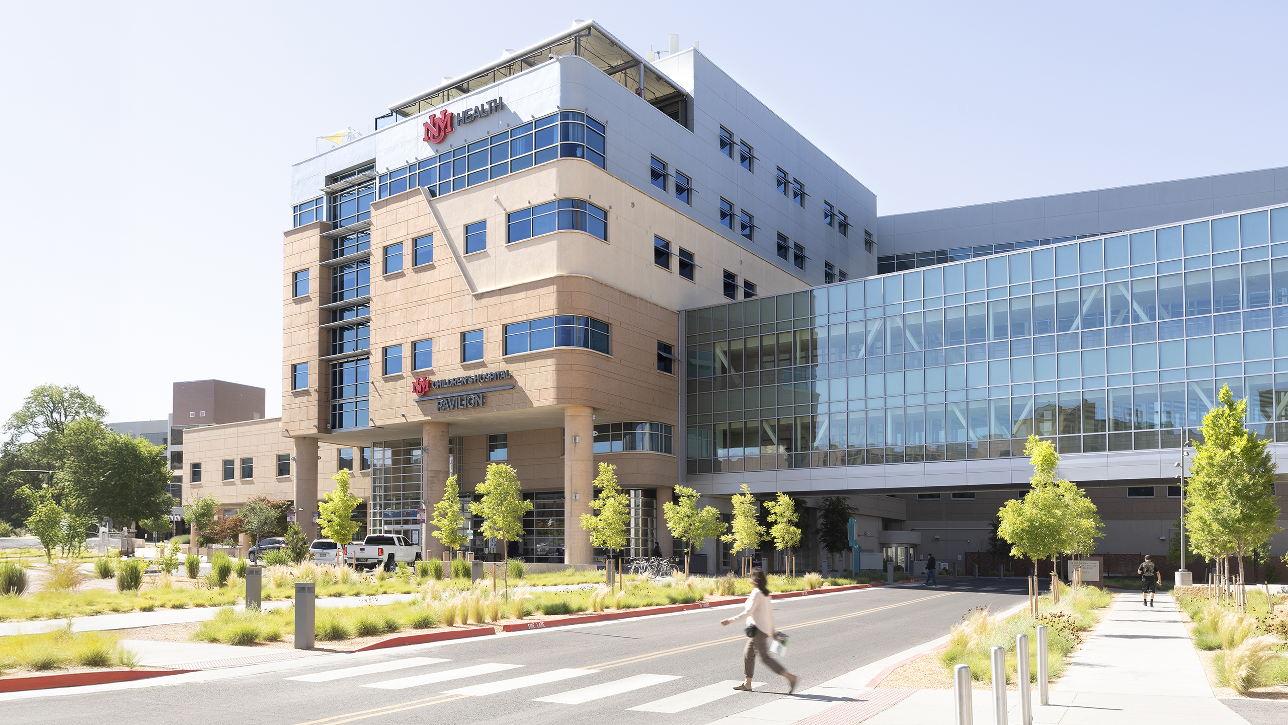 Completed exterior face illuminated building identification sign for UNM Children's Hospital Pavilion.