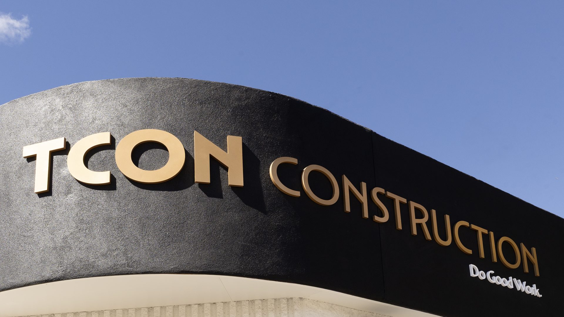 Close up view of TCON Construction Exterior Building Lettering
