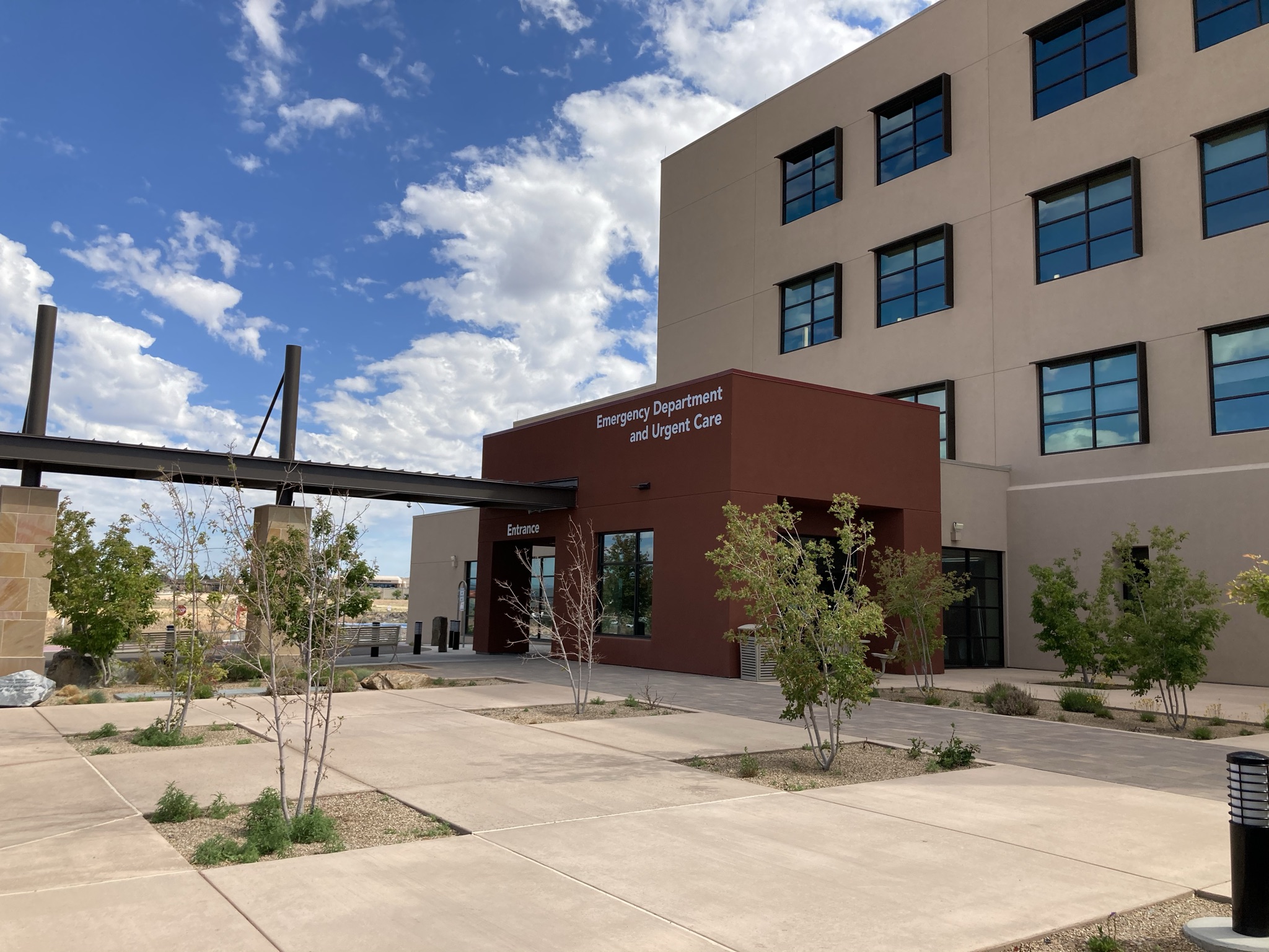 Exterior dimensional letters identify the Emergency Department and Urgent Care entrance at Presbyterian Santa Fe Medical Center.