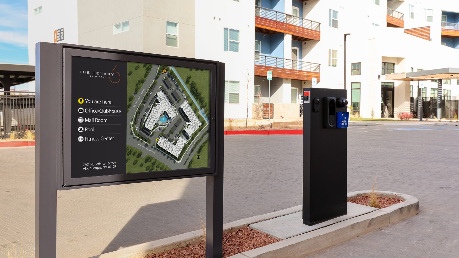 Exterior directory map sign displaying property layout, amenities, and building locations for residents and visitors.