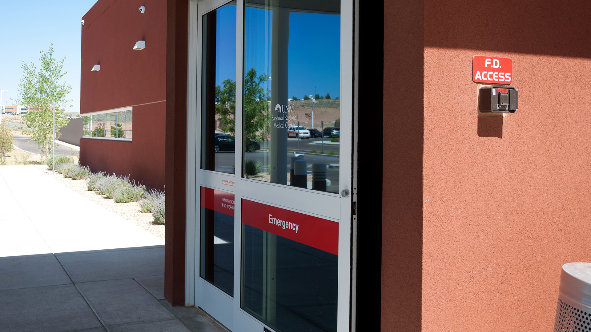 Emergency entrance door vinyl graphics at UNM Sandoval Regional Medical Center