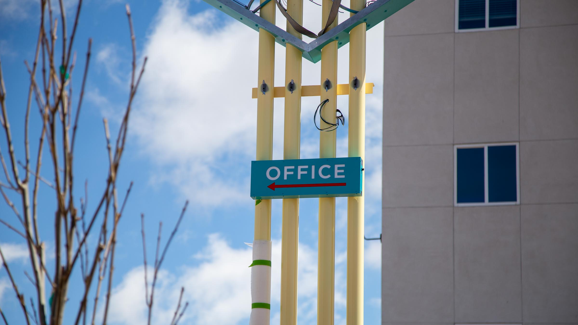 Luminaria Senior Center Pylon Install showing the OFFICE sign